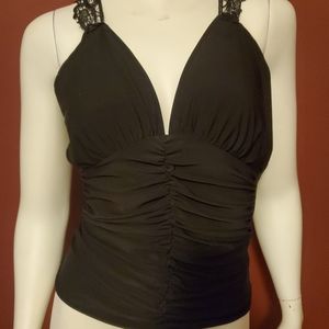 Sleeveless top with embroidered back